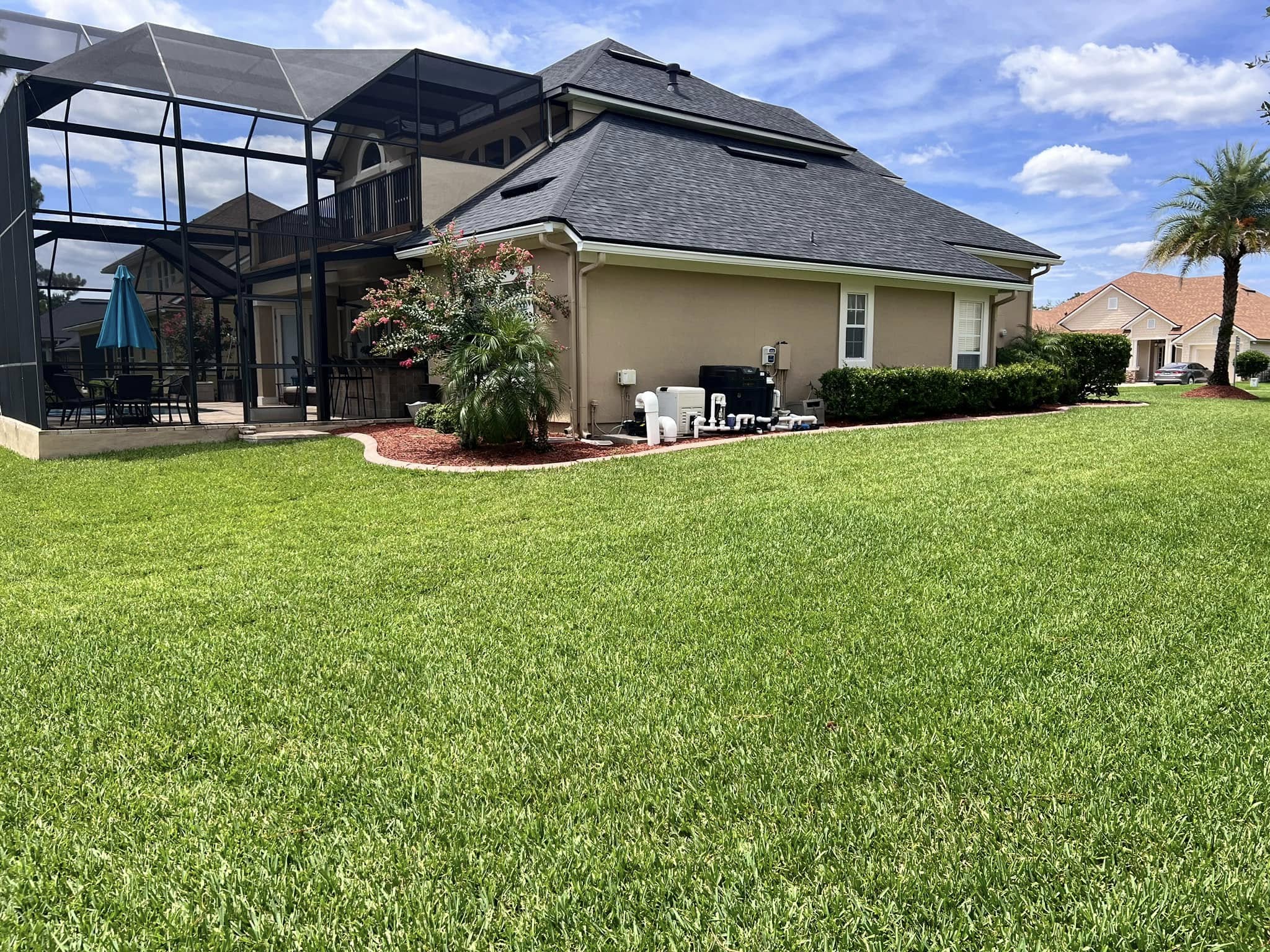 Lawn top dressing improving compacted soil on an Oakleaf Plantation, FL property